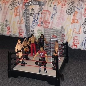 WWE ring with 6 figures
